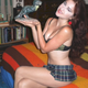 Illustration for article titled Dinosaurs + Confused Bikini Models = The Internets New Strangest Site